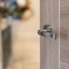 STATUS Nevada Lever Door Handle on Round Rose - Polished Chrome (Pair)