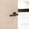Millhouse Brass Cartwright Knurled Lever Door Handle on Round Rose - Matt Black (Pair)