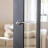Forme Olimpia Lever Door Handle on Concealed Round Rose - Satin Chrome (Pair)