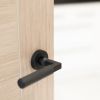 Millhouse Brass Cartwright Knurled Lever Door Handle on Round Rose - Matt Black (Pair)