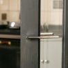 Forme Boston Lever Door Handle on Concealed Round Rose - Matt Black (Pair)