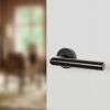 Forme Elle Lever Door Handle on Minimal Round Rose - Matt Black (Pair)