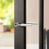 Millhouse Brass Mason Lever Door Handle on Concealed Round Rose - Matt Black (Pair)