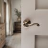 Old English Colchester Lever Door Handle on Round Rose - Antique Brass (Pair)