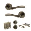 STATUS Texas Door Handle Pack (Bathroom Set - 2.5" CE Bathroom Lock, 4" Slim Knuckle Hinges x2) - Antique Brass