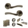 STATUS Texas Door Handle Pack (Euro Lock Set - 3" CE Sashlock, 4" Slim Knuckle Hinges x2) - Antique Brass