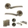 STATUS Indiana Door Handle Pack (Bathroom Set - 3" CE Bathroom Lock, 4" Slim Knuckle Hinges x2) - Antique Brass