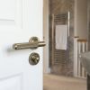 Complete Bari Door Handle Pack - Bathroom Lock (Standard Thumb Turn) - Antique Brass - 65mm / 4-inch Hinges - JE-D5A3-AB