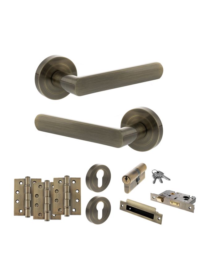 STATUS Carolina Door Handle Pack (Euro Lock Set - 3" CE Sashlock, 4" Fire Rated Hinges x3) - Antique Brass
