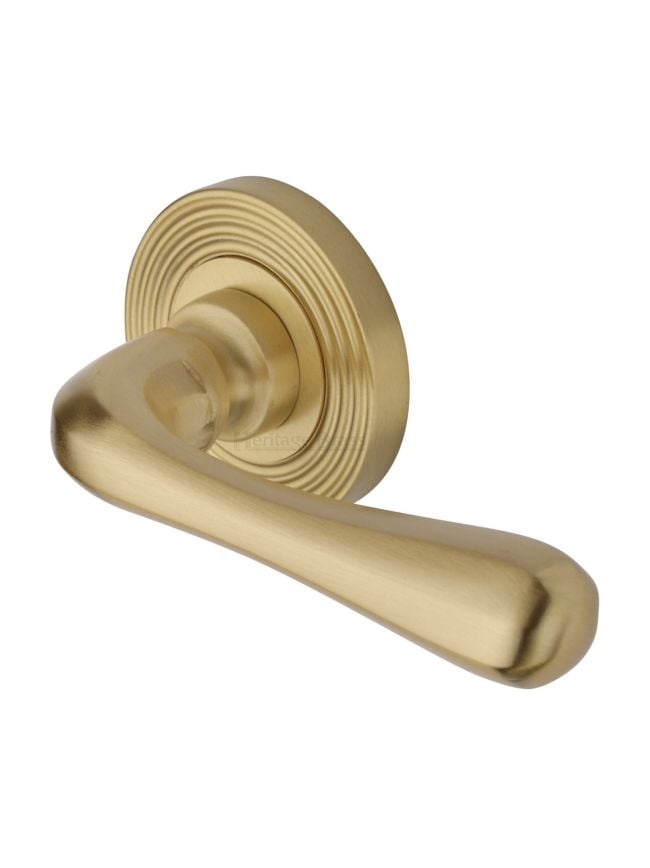 Heritage Brass Door Handle Lever Latch on Round Rose Charlbury Reeded Design Satin Brass finish
UK Registered Design Number 6226298