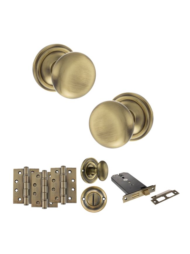 Old English Harrogate Door Knob Pack (Lock Set - Horizontal Bathlock, 4" Fire Rated Hinges x3) - Antique Brass