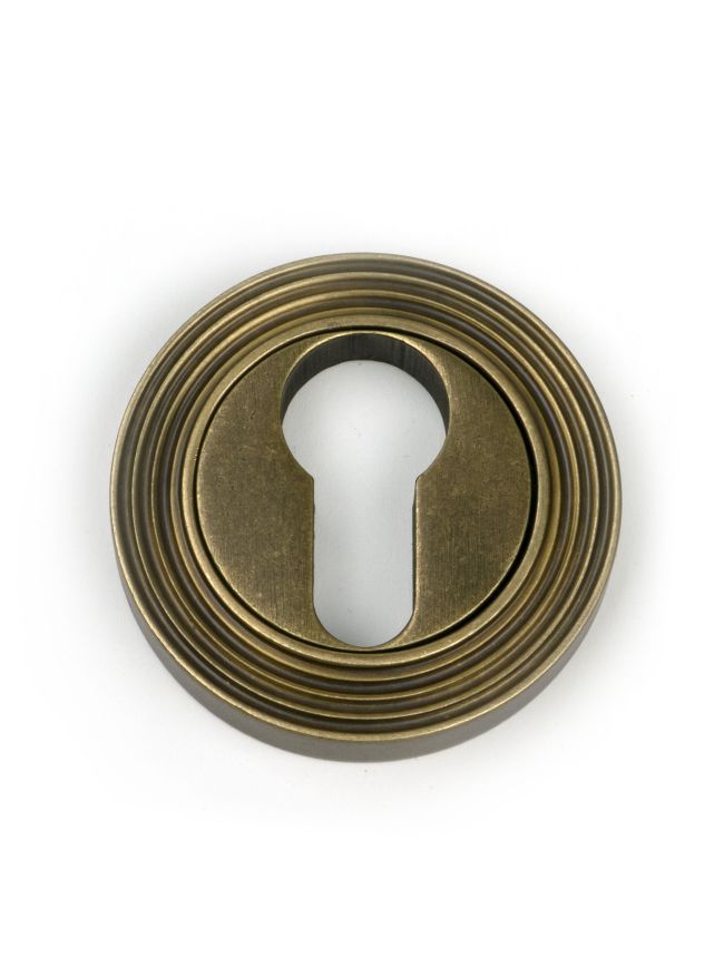 Burnished Brass Round Euro Escutcheon (Beehive)