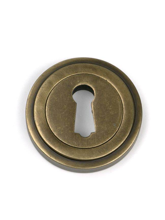 Burnished Brass Round Escutcheon (Art Deco)