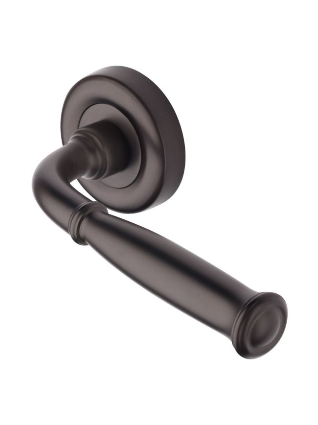 Heritage Brass Door Handle Lever Latch on Round Rose Lincoln Design Matt Bronze finish
UK Registered Design Number 6228268