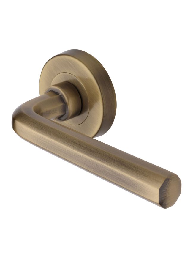 Heritage Brass Door Handle Lever Latch on Round Rose Octave Design Antique Brass finish
UK Registered Design Number 6228267