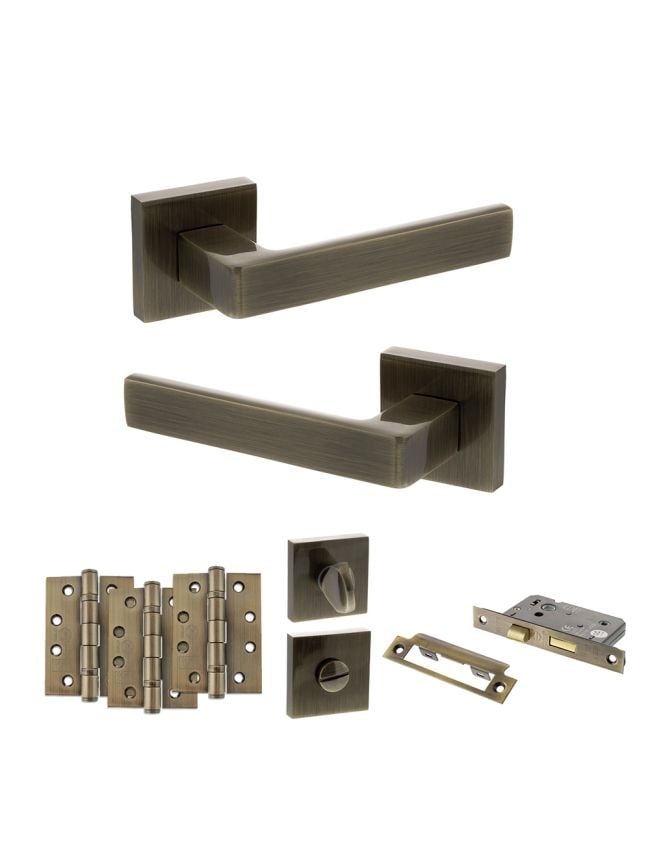 STATUS Montana Door Handle Pack (Bathroom Set - 3" CE Bathroom Lock, 4" Fire Rated Hinges x3) - Antique Brass