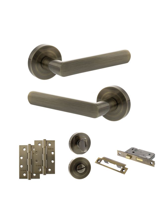 STATUS Carolina Door Handle Pack (Bathroom Set - 3" CE Bathroom Lock, 4" Slim Knuckle Hinges x2) - Antique Brass