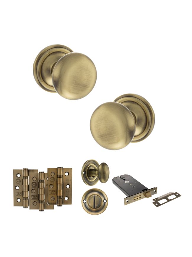 Old English Harrogate Door Knob Pack (Lock Set - Horizontal Bathlock, 3" Fire Rated Hinges x3) - Antique Brass