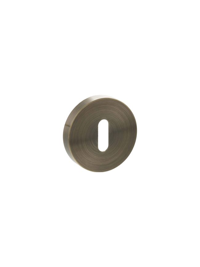 Senza Pari Key Escutcheons on Minimal Round Rose - Antique Brass (Pair)