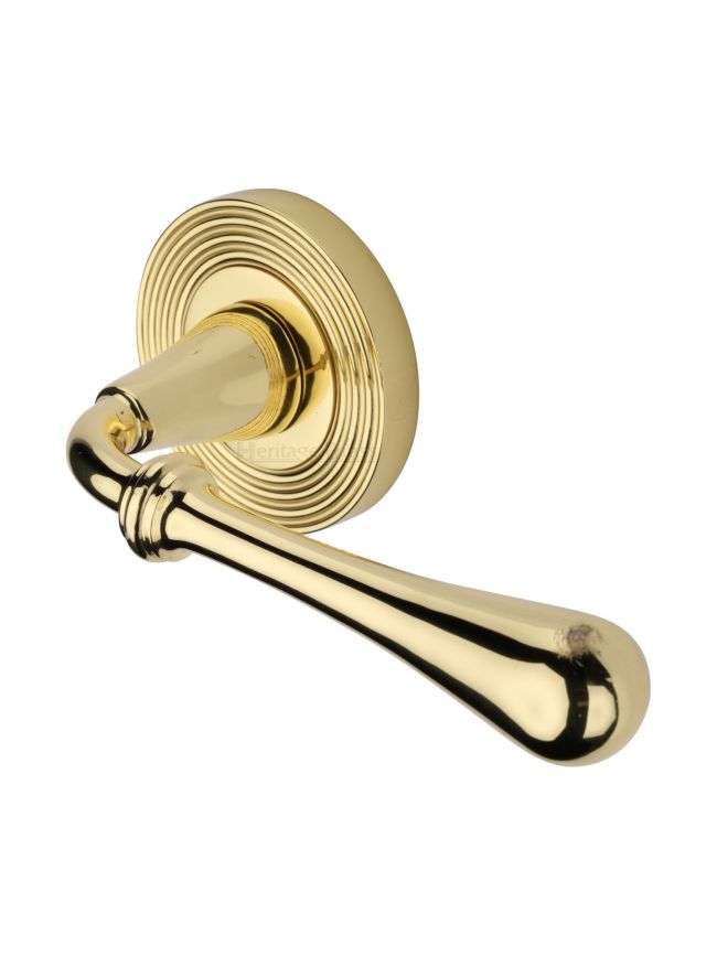 Heritage Brass Door Handle Lever Latch on Round Rose Roma Reeded Design Polished Brass finish
UK Registered Design Number 6226296