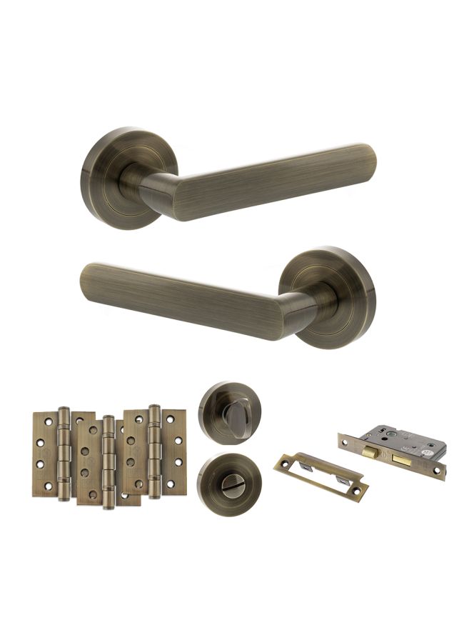 STATUS Carolina Door Handle Pack (Bathroom Set - 3" CE Bathroom Lock, 4" Fire Rated Hinges x3) - Antique Brass