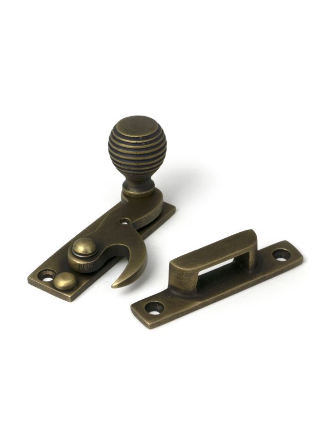 Burnished Brass Beehive Sash Hook Fastener