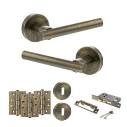 STATUS Nebraska Door Handle Pack (3 Lever Lock Set - 3" CE Sashlock, 4" Fire Rated Hinges x3) - Antique Brass