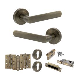 STATUS Carolina Door Handle Pack (Euro Lock Set - 3" CE Sashlock, 4" Fire Rated Hinges x3) - Antique Brass