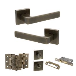 STATUS Montana Door Handle Pack (Bathroom Set - 2.5" CE Bathroom Lock, 3" Fire Rated Hinges x3) - Antique Brass