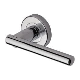 Heritage Brass Door Handle Lever Latch on Round Rose Challenger Design Polished Chrome finish