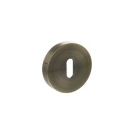 Senza Pari Key Escutcheons on Round Rose - Antique Brass