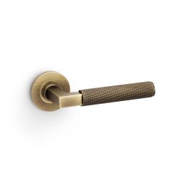 Alexander & Wilks - Hurricane Knurled Lever on Round Rose - Antique Brass