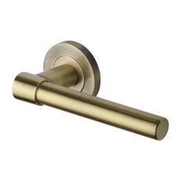 Heritage Brass Door Handle Lever on Rose Phoenix Design Antique Brass Finish