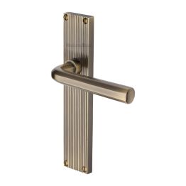 Heritage Brass Octave Reeded Lever Latch Antique Brass finishUK Design Registration Number 6234528