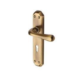Heritage Brass Door Handle Lever Lock Charlbury Design Antique Brass finish
