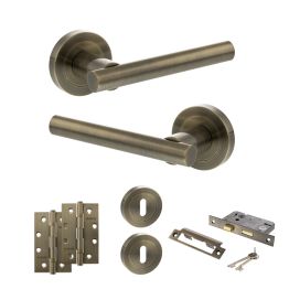 STATUS Nebraska Door Handle Pack (3 Lever Lock Set - 2.5" CE Sashlock, 4" Slim Knuckle Hinges x2) - Antique Brass