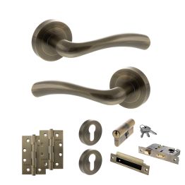 STATUS Texas Door Handle Pack (Euro Lock Set - 2.5" CE Sashlock, 4" Slim Knuckle Hinges x2) - Antique Brass