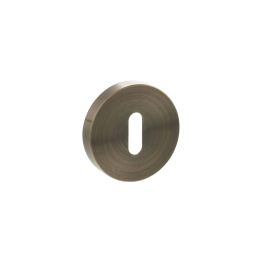 Senza Pari Key Escutcheons on Minimal Round Rose - Antique Brass