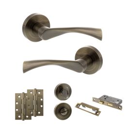 STATUS Colorado Door Handle Pack (Bathroom Set - 3" CE Bathroom Lock, 4" Slim Knuckle Hinges x2) - Antique Brass