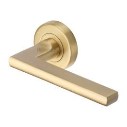 Heritage Brass Door Handle Lever Latch on Round Rose Trident Design Satin Brass finish