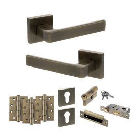 STATUS Montana Door Handle Pack (Euro Lock Set - 3" CE Sashlock, 4" Fire Rated Hinges x3) - Antique Brass