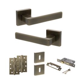 STATUS Montana Door Handle Pack (3 Lever Lock Set - 3" CE Sashlock, 4" Slim Knuckle Hinges x2) - Antique Brass