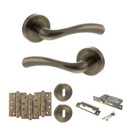 STATUS Texas Door Handle Pack (3 Lever Lock Set - 3" CE Sashlock, 4" Fire Rated Hinges x3) - Antique Brass