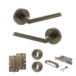 STATUS Alabama Door Handle Pack (3 Lever Lock Set - 2.5" CE Sashlock, 4" Slim Knuckle Hinges x2) - Antique Brass