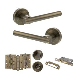 STATUS Nebraska Door Handle Pack (Bathroom Set - 3" CE Bathroom Lock, 4" Fire Rated Hinges x3) - Antique Brass