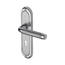 Heritage Brass Door Handle Lever Lock Saturn Design Apollo finish
