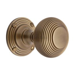 Heritage Brass Mortice Knob on Rose Reeded Design Antique Brass finish