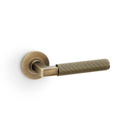 Alexander & Wilks - Hurricane Reeded Lever on Round Rose - Antique Brass