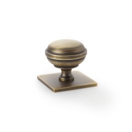 Alexander & Wilks - Quantock Cupboard Knob on Square Backplate - Antique Brass - 34mm