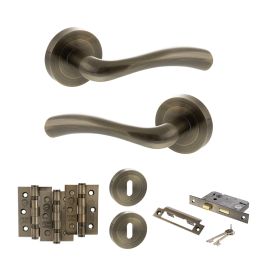 STATUS Texas Door Handle Pack (3 Lever Lock Set - 2.5" CE Sashlock, 3" Fire Rated Hinges x3) - Antique Brass